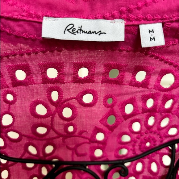 Reitman‘s fuchsia pink eyelet blouse with tie bottom, at waist. - Picture 3 of 10